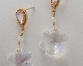 16K Gold plated over brass pear cut CZ earrings with sterling silver post and swarovski crystal snowflake. Very Pretty.