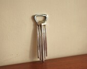 Vintage modern chrome bottle opener