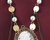 Antiqued Victorian Woman Hanging onto Brass