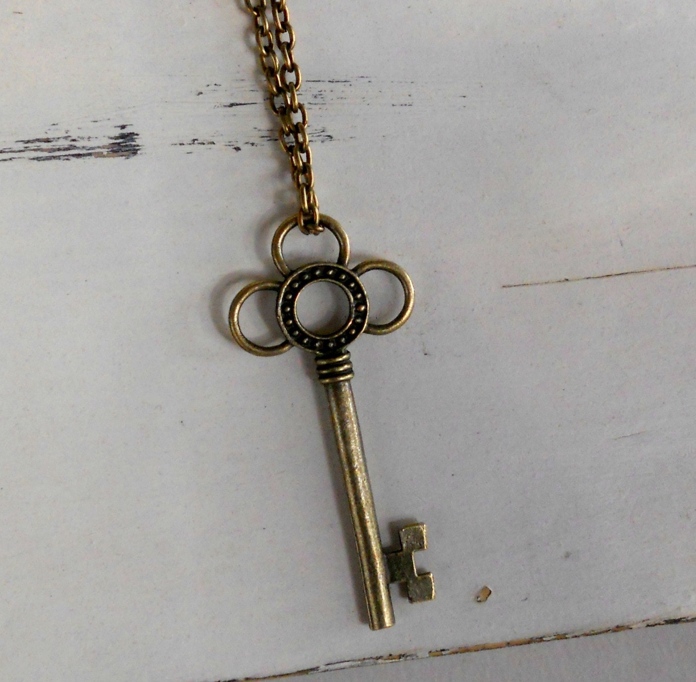 Skeleton Key Charm Necklace. Brass. Ornate, Steampunk. What does this key unlock....