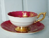 Vintage Ruby Red Flora and Fauna Tea Cup and Saucer