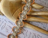 Handmade Micro macrame bracelet in peach, pearls and silver gray.