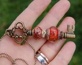 Add A Bead brass plated changeable Key Pendant with Dan O Lampwork European Charm Bead