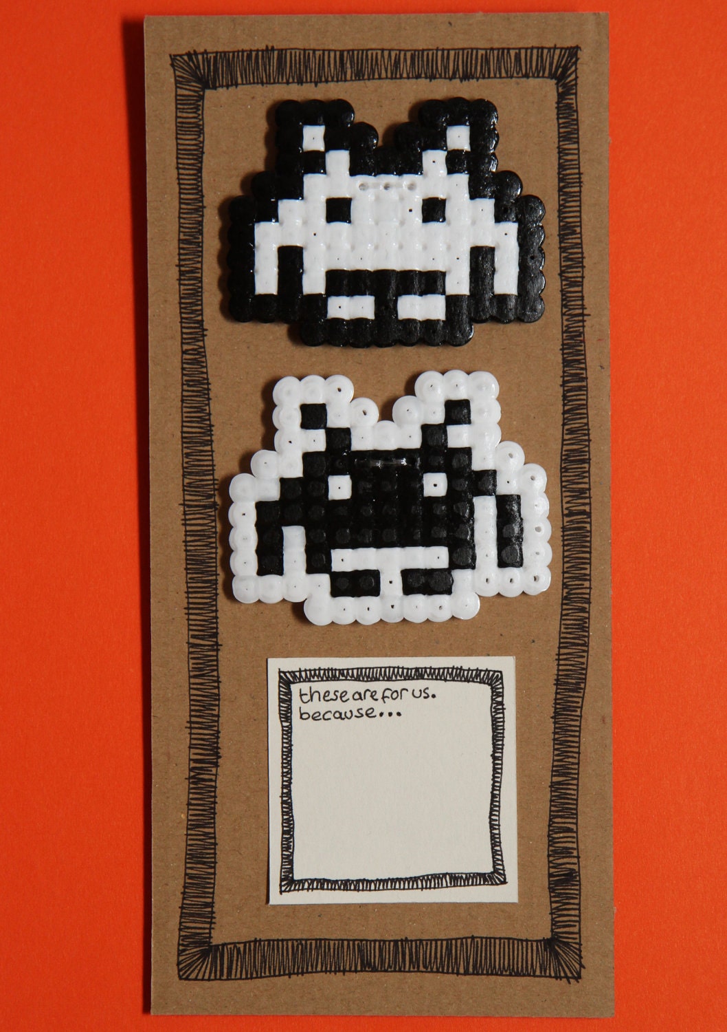 Double retro space invaders badge sharing gift set.