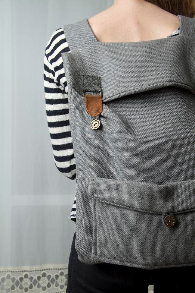 Big laptop backpack in grey with brown buckles