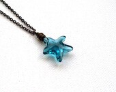 Swarovski starfish necklace, Indicolite blue crystal Antiqued brass chain