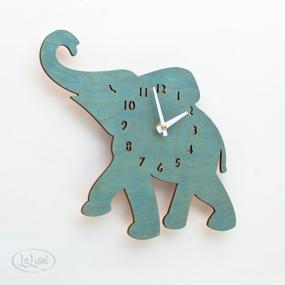 The "Baby Turquoise / Teal Elephant" designer wall mounted clock from LeLuni - LeLuni
