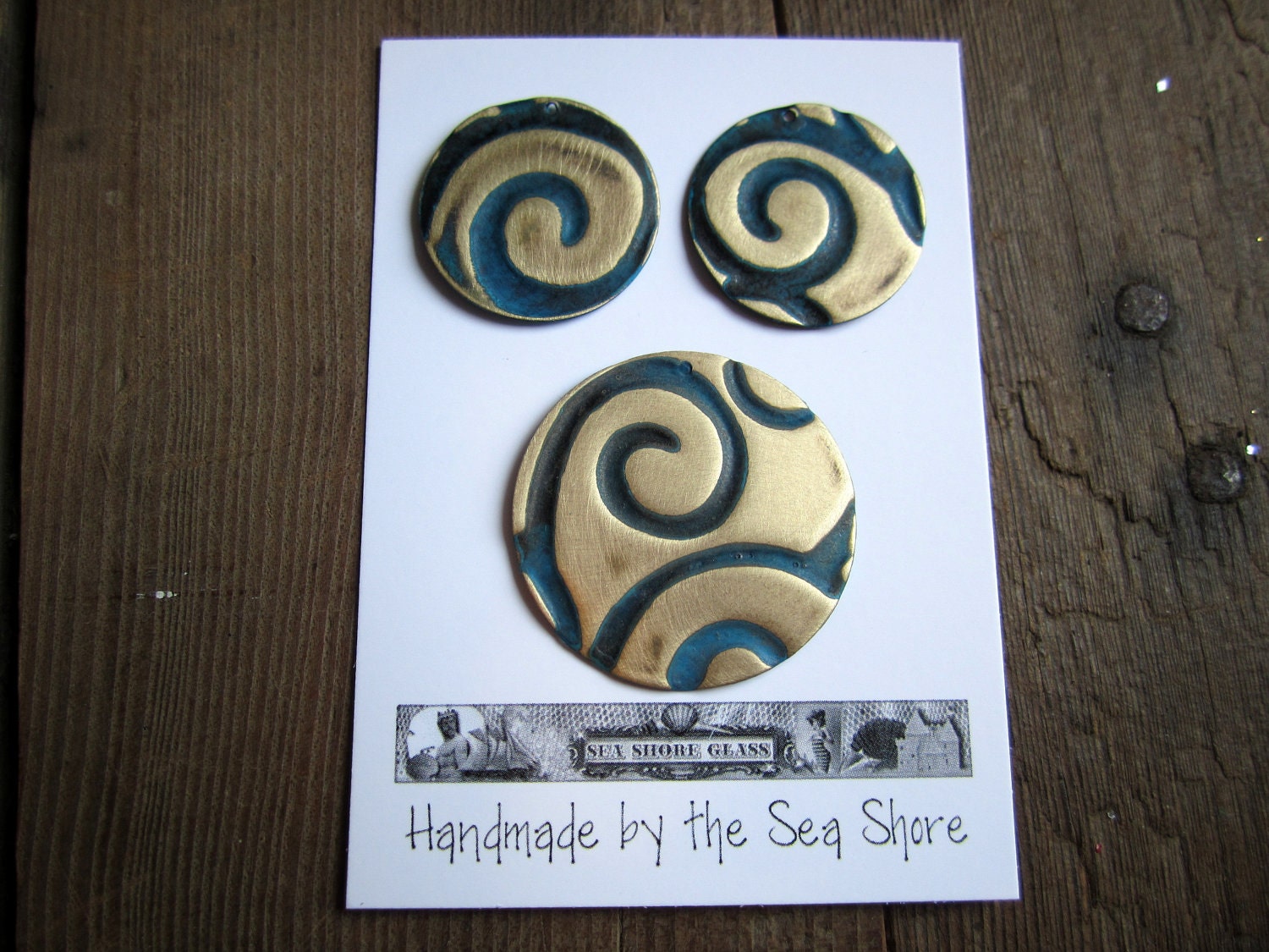 Vintaj Natural Brass embossed pendants and charms