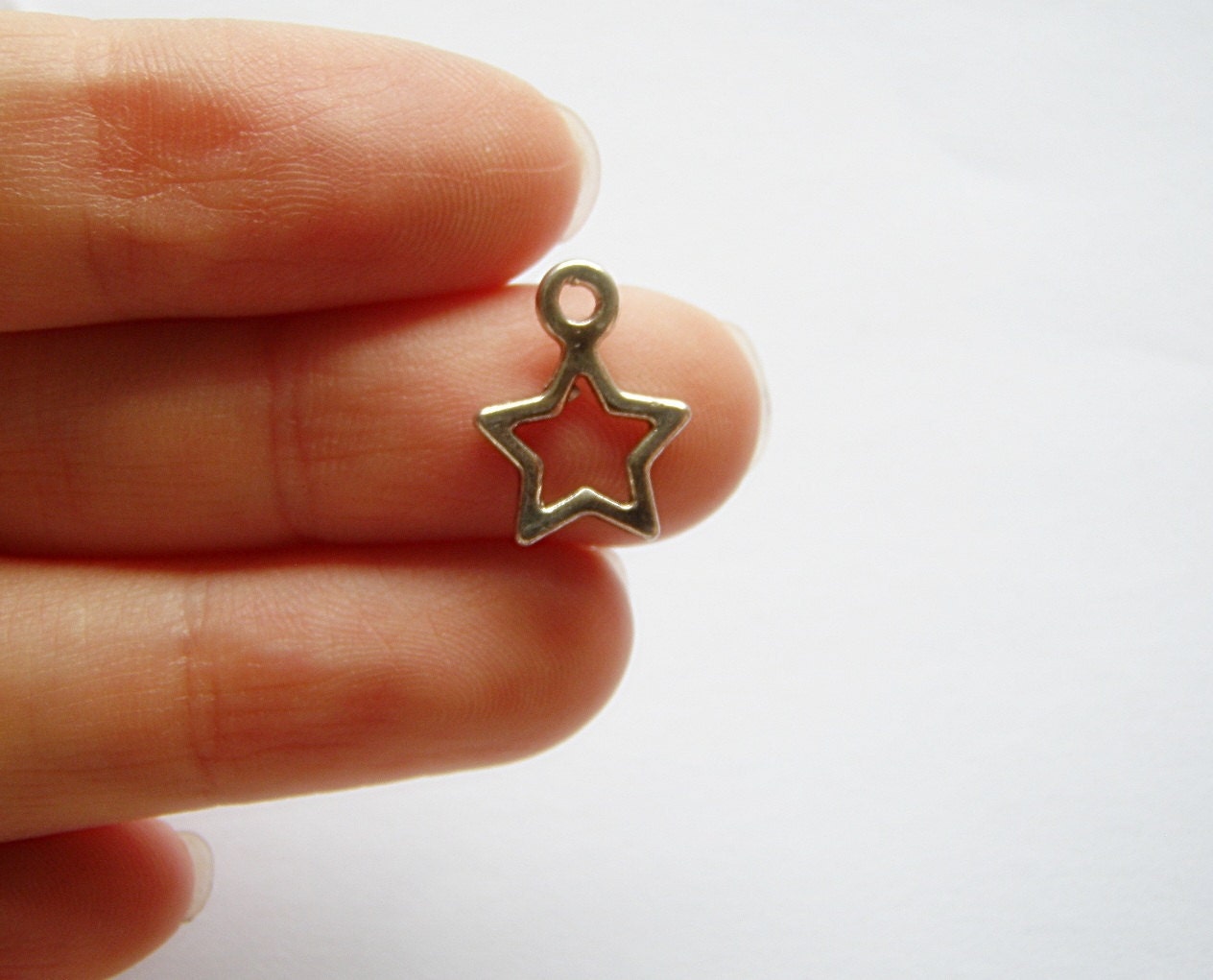 10 tibetan silver STAR charms 10mm x 10mm