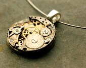 steampunk RUBY eyed PATINA pendant
