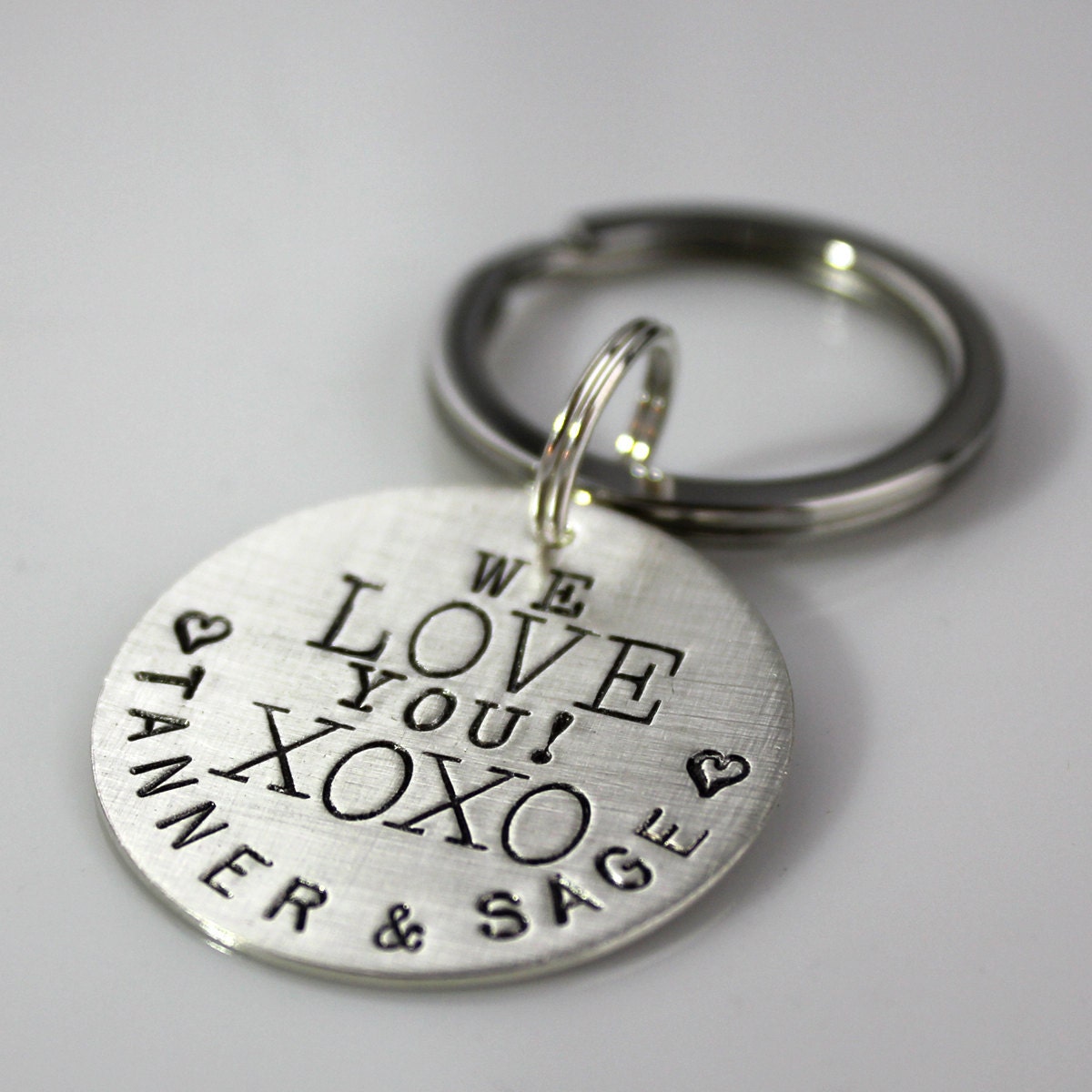 Personalized We Love You XOXO hand stamped sterling silver keychain
