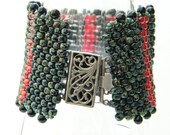 Luxuriously Nubby Cerise and Grey Green Striped bracelet with black onyx trim