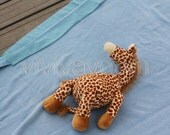 Stuffed Gentle Giraffe lying on blue fleece fluffy blankie blanket torn ribbon on edge childhood toy photograph 8 x 10