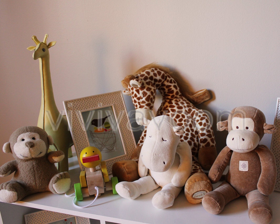 Childhood toys on shelf giraffes monkeys hippo wooden duck pull toy photograph 8 x 10