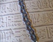Micro macrame bracelet in amethyst and pale blue with swarovski crystals