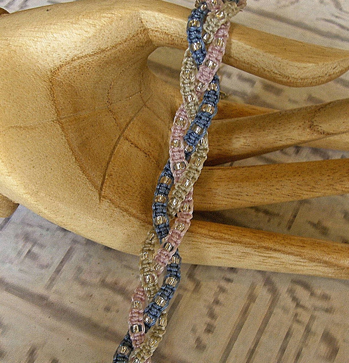 Macrame braided bracelet. Wrap beaded  friendship bracelet in pink blue and gray.