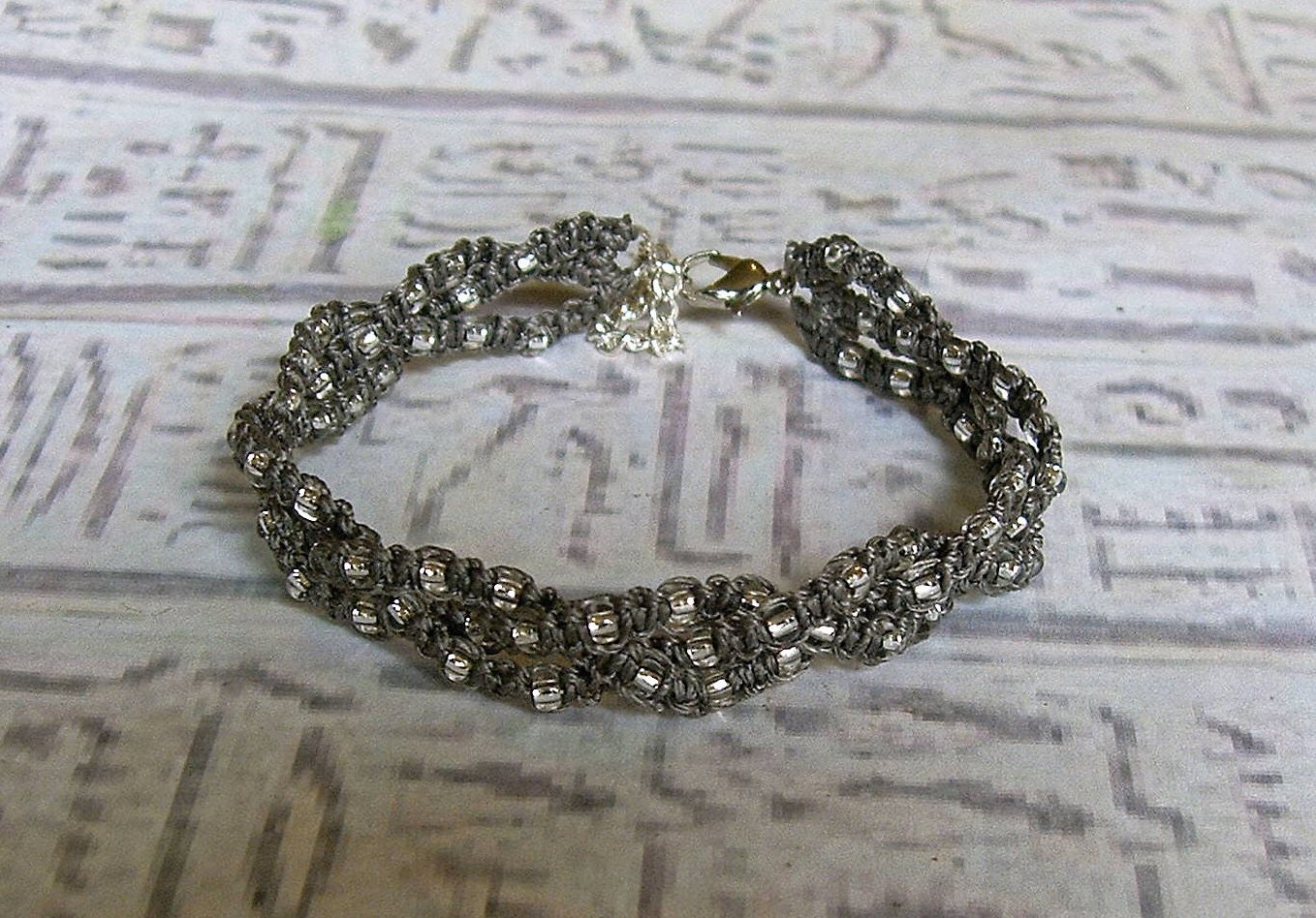 Braided bracelet. Macrame beaded  friendship bracelet in gray taupe.