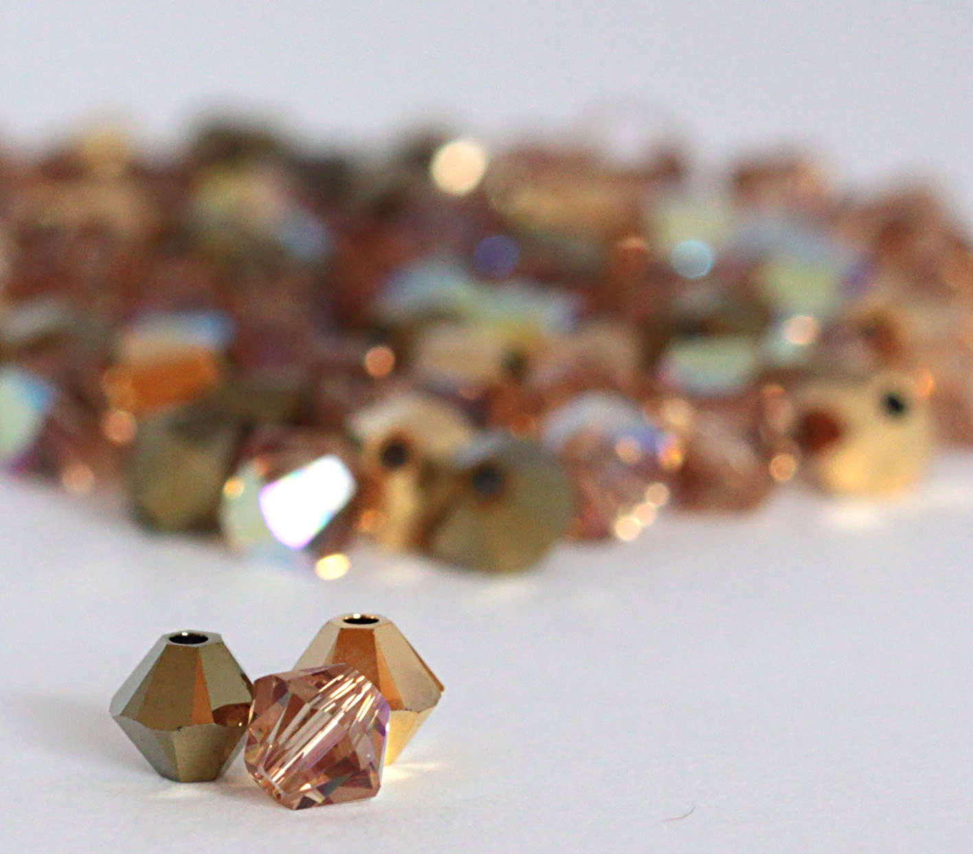 Swarovski Crystal Beads - 42,  4 mm bicone - Gold Crystal Mix