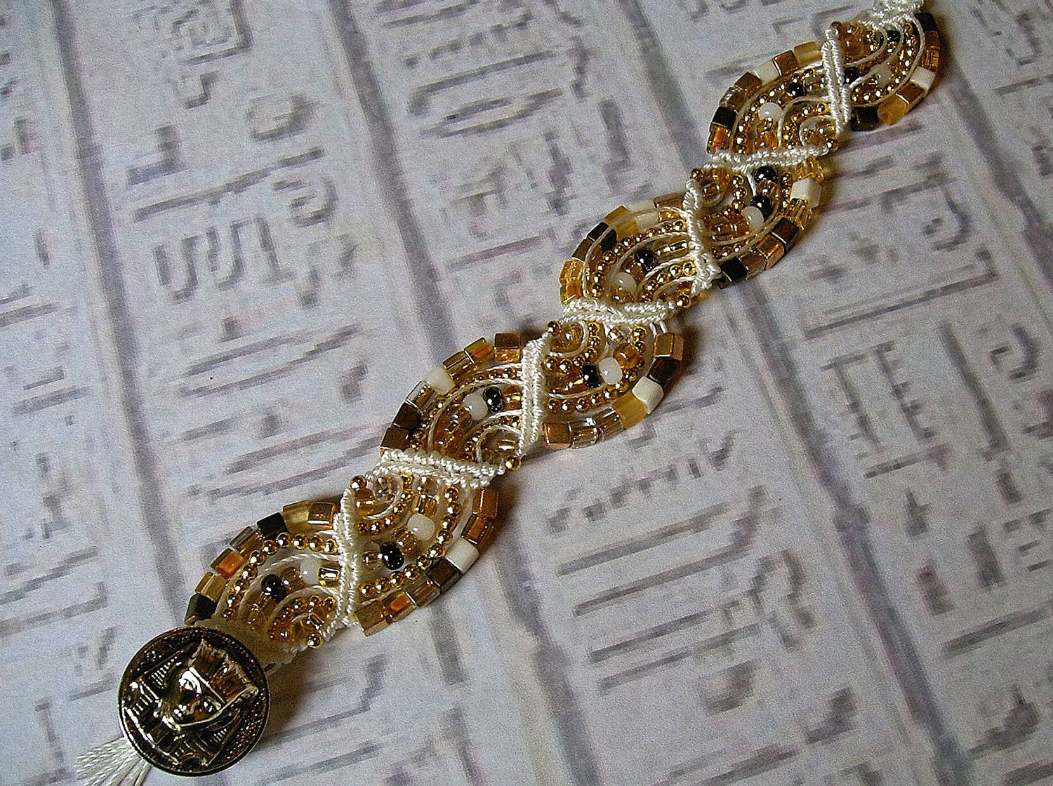 Micro macrame bracelet in white and gold. Egyptian macrame bracelet.