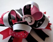 Pretty black and pink heart Bottlecap hair bow.