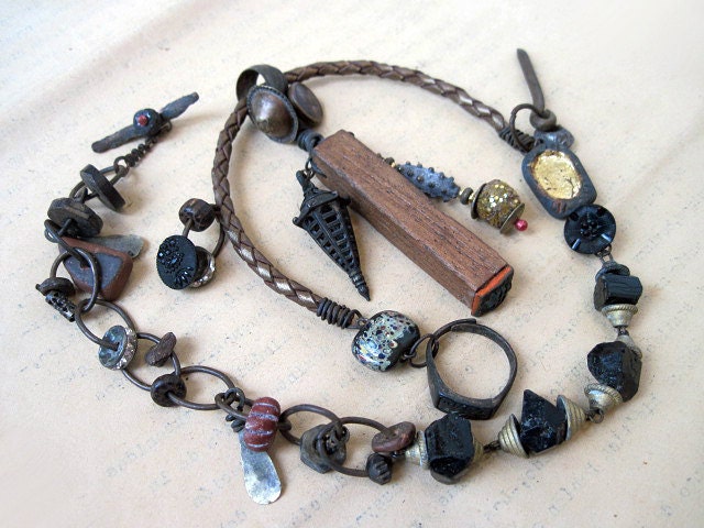 The World. Primitive Rustic Tribal Gypsy Assemblage with Japanese stamp, tourmaline.
