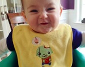 Zombie Baby embroidered feeding bib.
