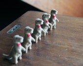 Set of five flocked T-rex's with bow ties