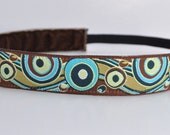 Band-It Headband .... Funky Geometric in teal and brown.  Will stay put and not slip.