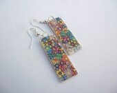polymer clay earrings featuring funky flowers
