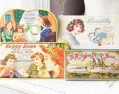 4 vintage sewing needle books