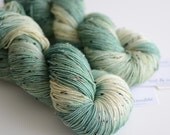 Hand Dyed Tweed Sock Yarn - Superwash Merino / Nylon 438 Yards - Ent - Pine Green and Cream