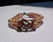copper gold pearl bracelet with copper gold meta slider and glass 2 hole panel