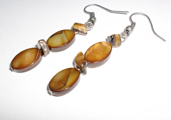 Oval amber shell earring