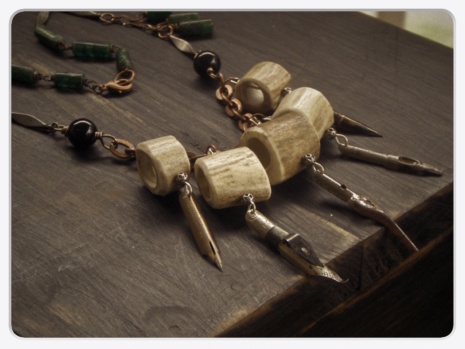 The Archivist of Black Mount Forest. Deer antler, vintage pen nibs, forest green agate tubes and black onyx necklace.