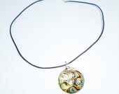 Colorful glass pendant with dark brown leather