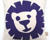 Lion cushion in organic cotton purple and green