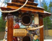 Rustic Star Birdhouse ready to hang outdoors