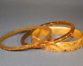 Trio of Amber Celluloid Bangle Bracelets.