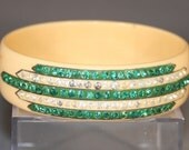 Wide Ivory Celluloid Bangle Bracelet with Green and Clear Rhinestones