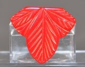 Red Bakelite Dress Clip