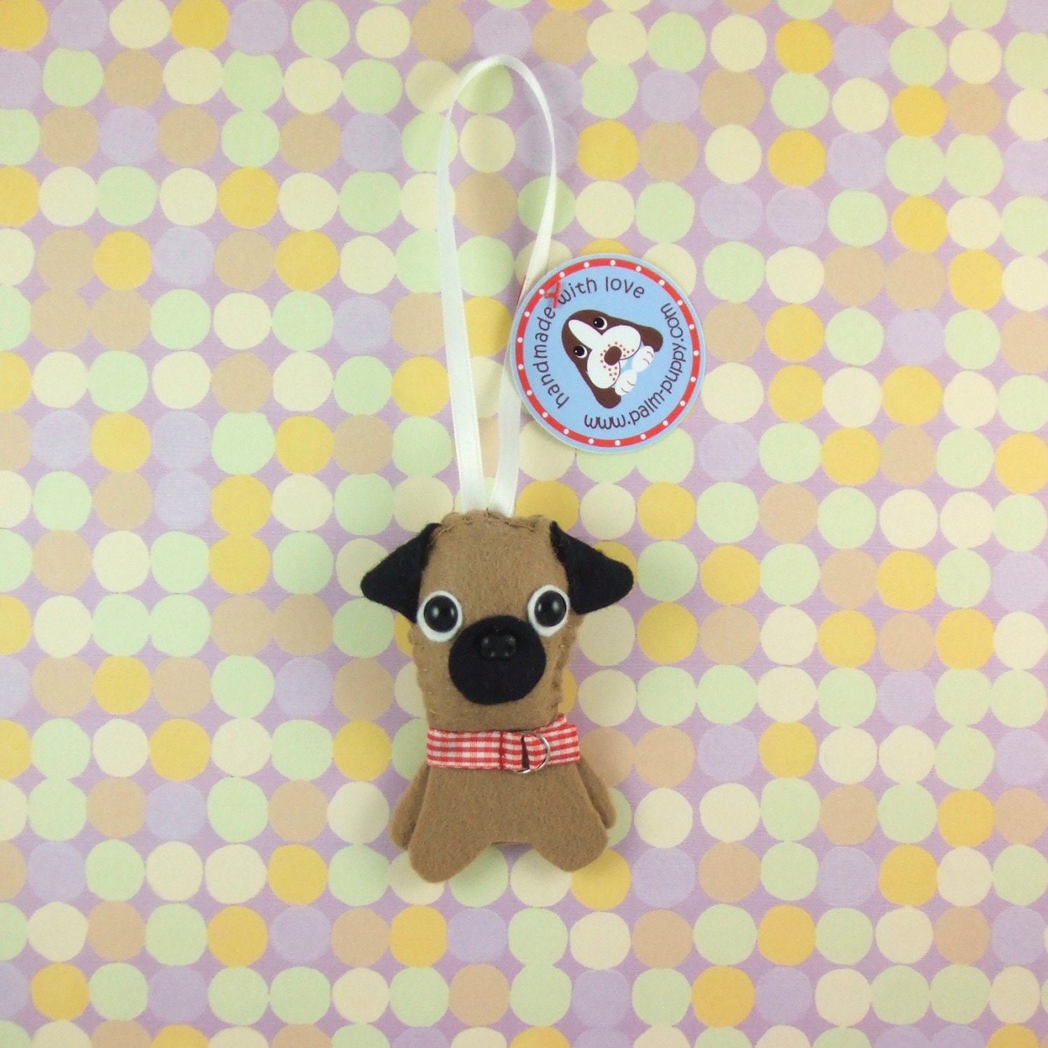 Tan Pug Hanging Phlat Puppy