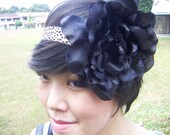The Atalanta, black silk flower on cheetah print