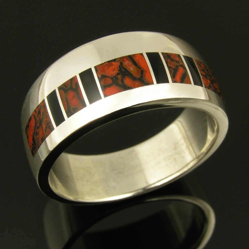 Sterling silver man's wedding band inlaid with dinosaur bone and black onyx.