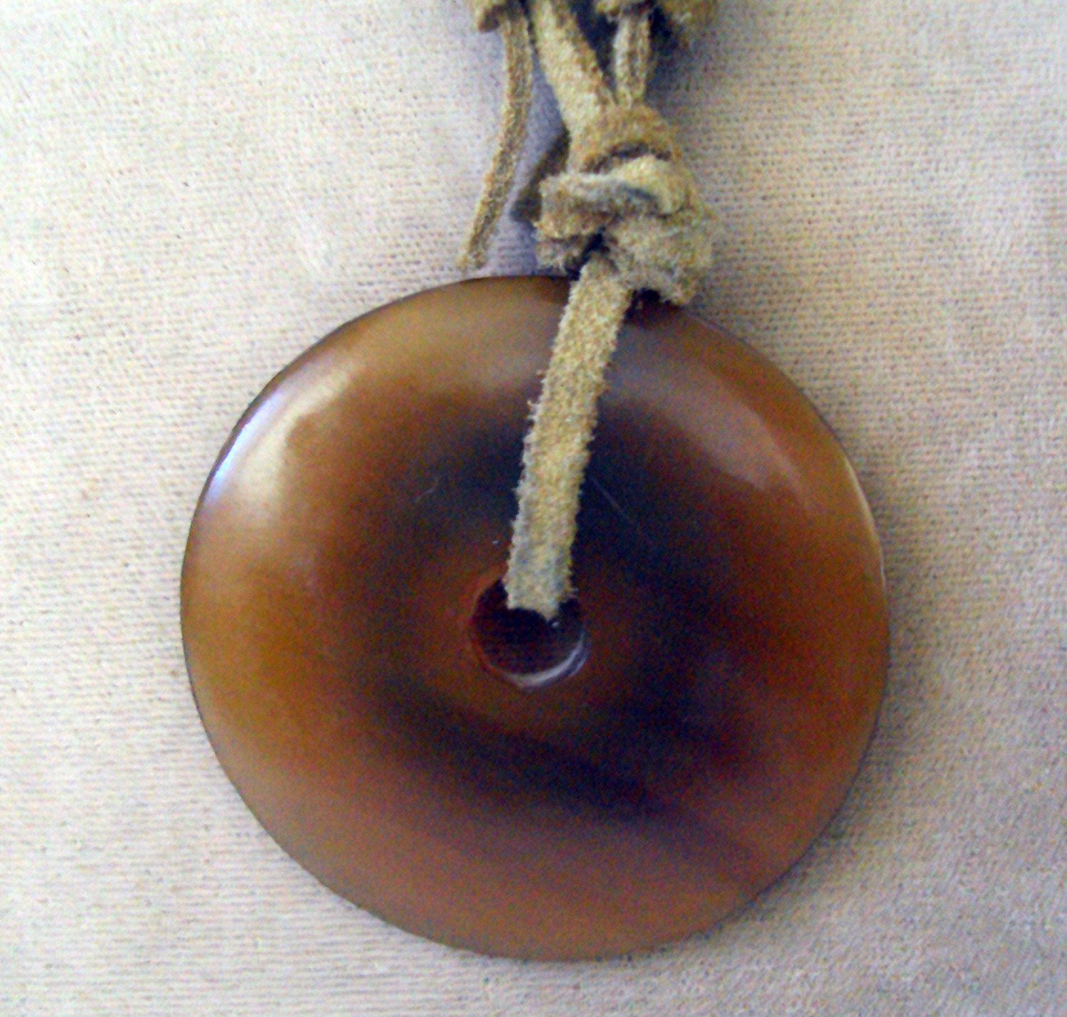 African Horn NecklacePendant on Raw Leather
