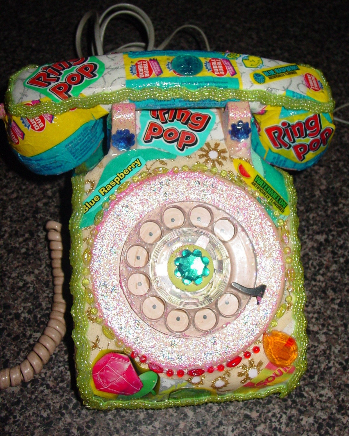 recycled vintage dial phone by C.Reinke RING POP candy wrappers.Kitsch at its best reserved for Emily