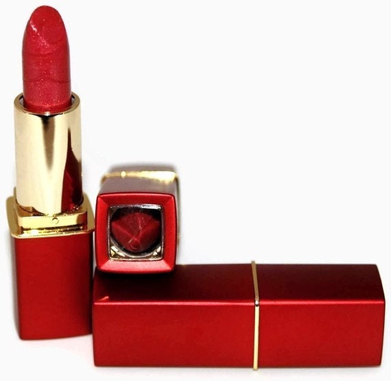 Kiss me Rhett lip rouge/lipstick.  Wearable red/pink, slightly sheer.  Mineral based, absolutely no dyes or carmine.
