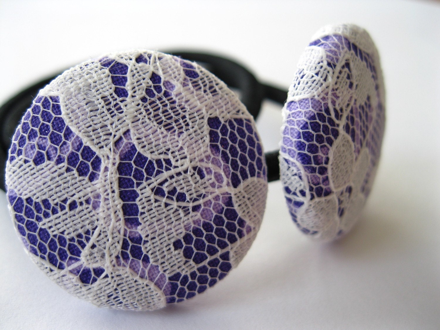 http://www.etsy.com/listing/72641155/ponytail-holders-set-of-two-covered