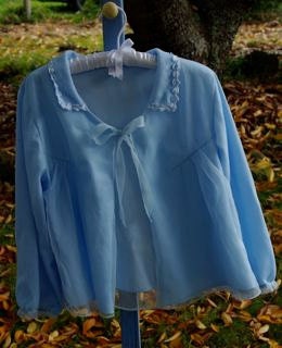 Pale blue vintage bed jacket