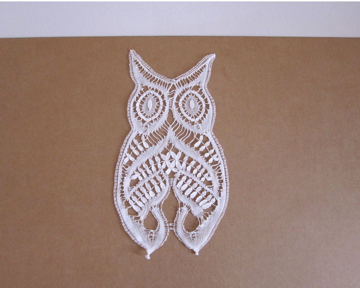 The owl of luck. Figure of bobbin lace from Spain