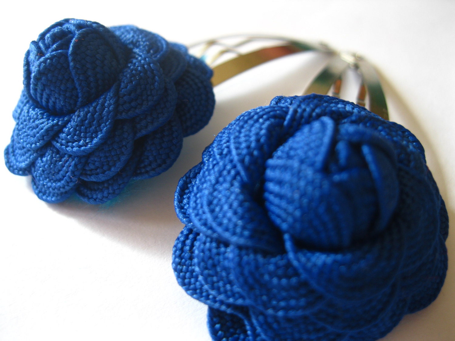 http://www.etsy.com/listing/80100710/flower-hair-accessories-royal-blue-roses